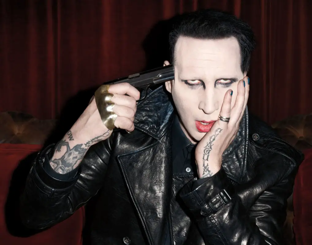 Marilyn Manson with a gun to his head