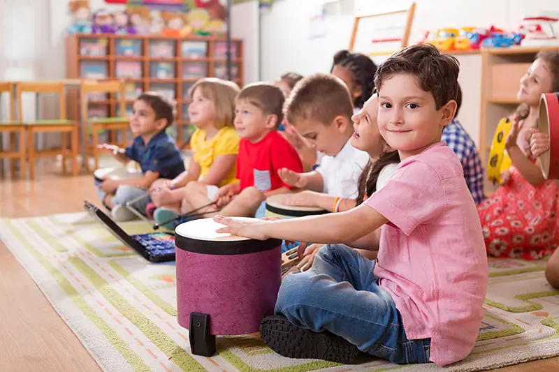 child playing the drums