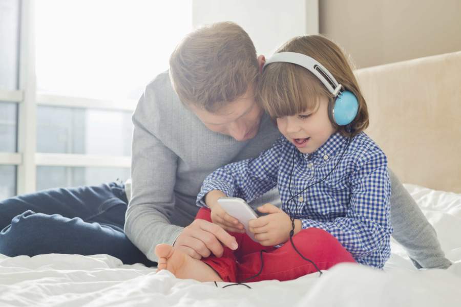 Father and son playing together