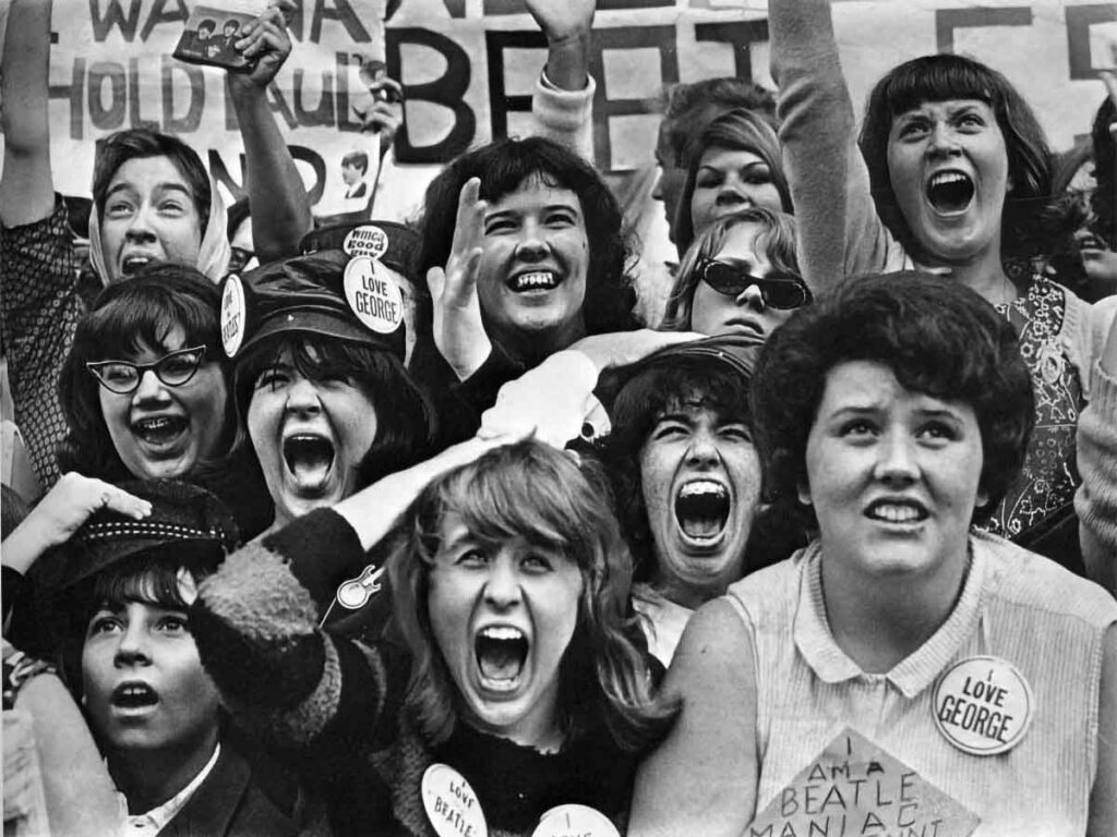 1963’s Biggest Chart-Toppers: The Dawn of Beatlemania beatles fans screaming