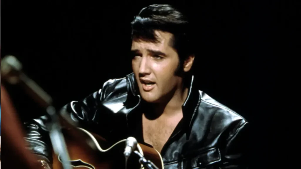 Elvis Presley playing guitar