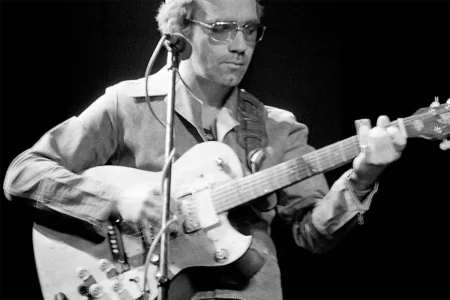 JJ Cale playing guitar