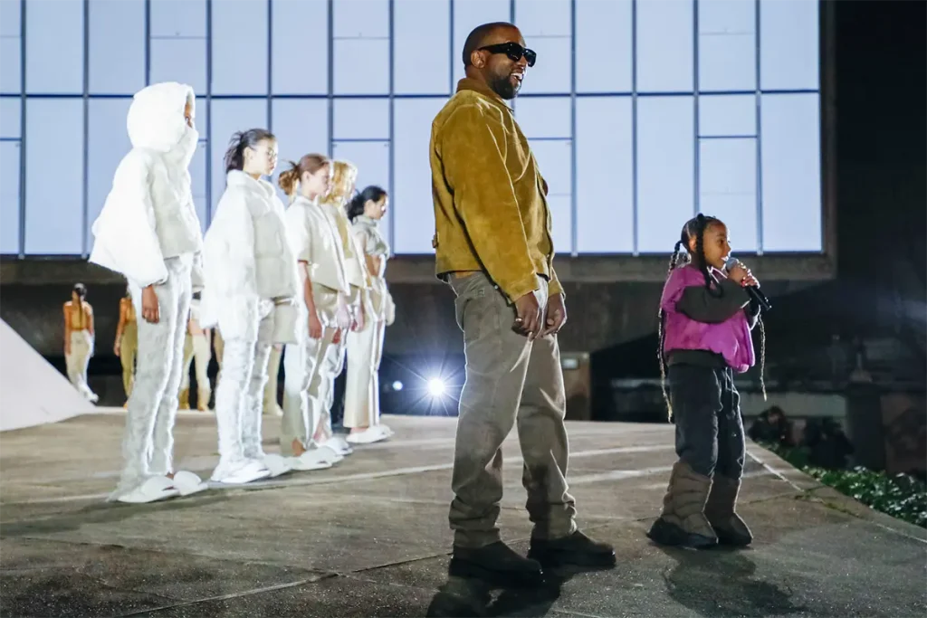 Kanye West an stage promoting his fashion brand Yeezy
