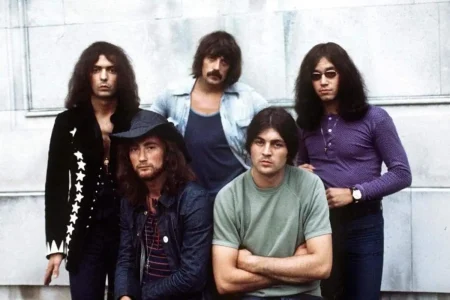 Deep Purple band members posing together in a classic group portrait.