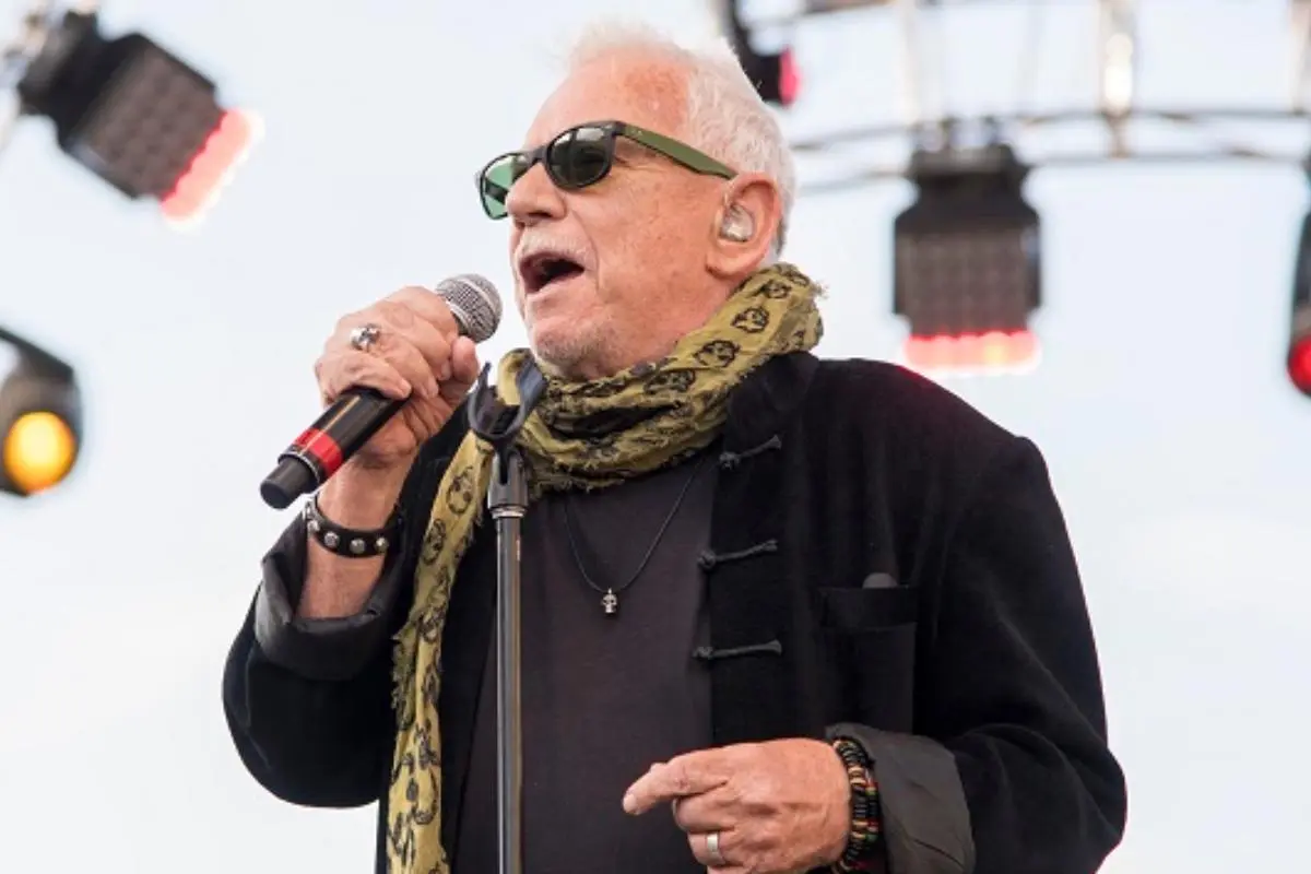 Eric Burdon (later years), performing live onstage with microphone