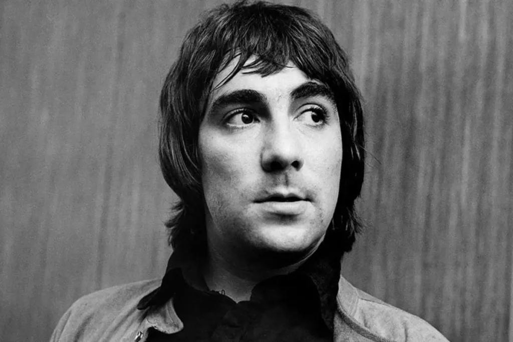When Keith Moon Crashed Led Zeppelin’s 1977 Tour: Myth, Mayhem, and the Truth Keith Moon with medium-length hair, looking off-camera with an intense, expressive gaze.