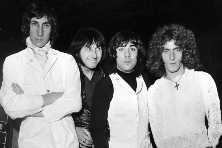 The Who lineup posing together in a vintage black-and-white portrait.