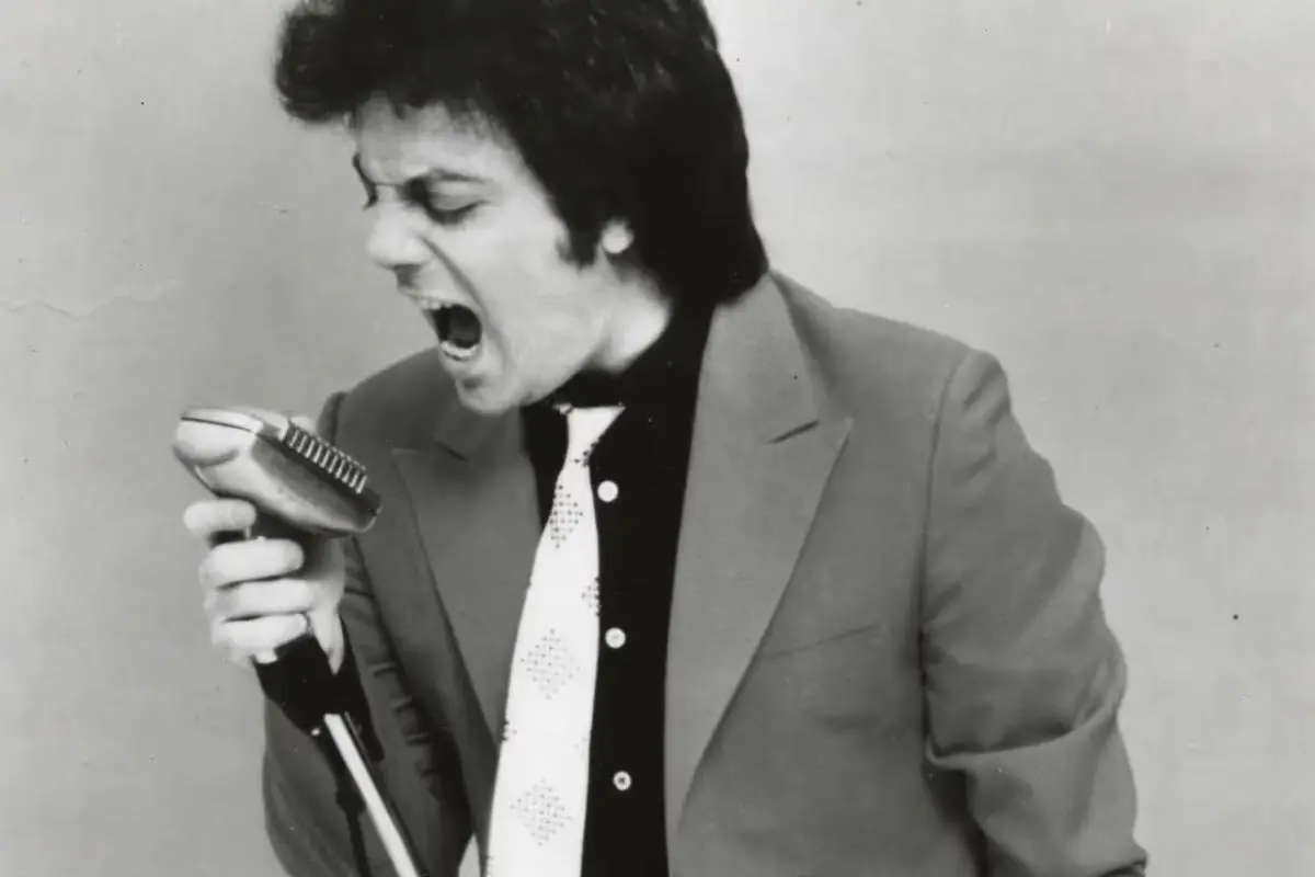 Billy Joel in a vintage black-and-white photo.