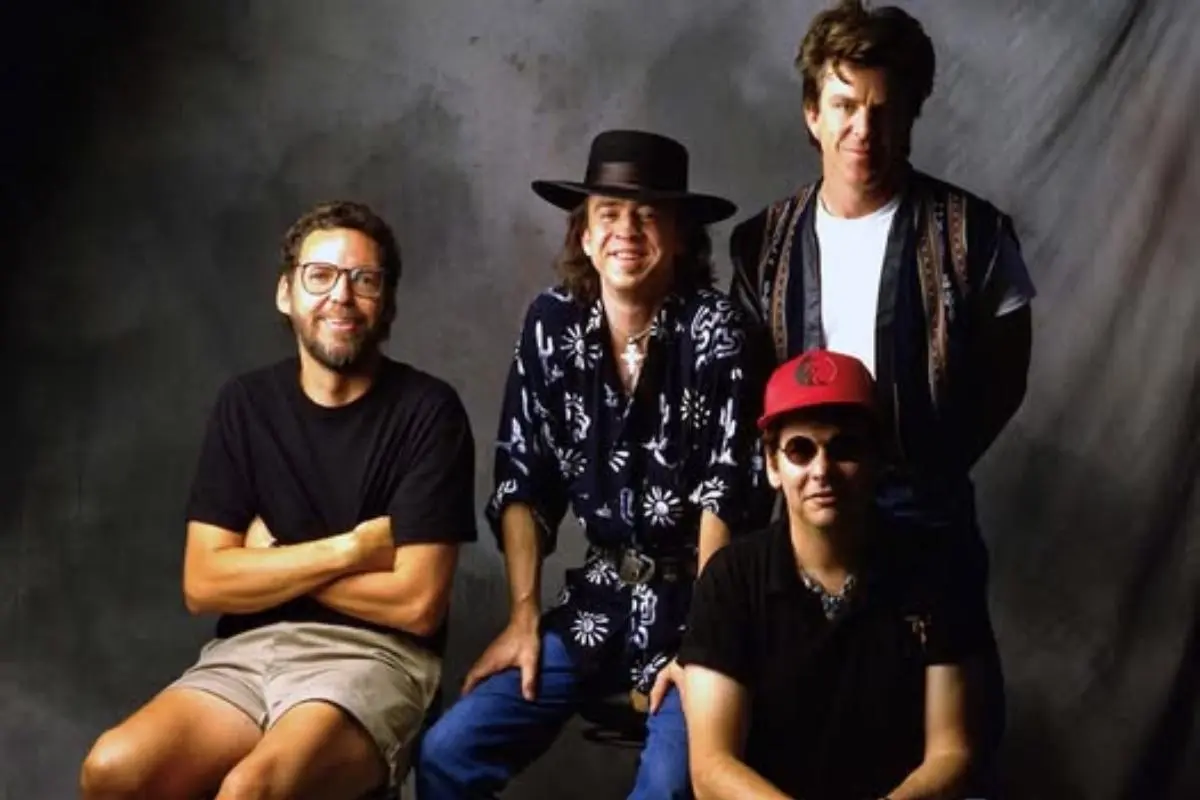 chris layton posing together in a studio-style group portrait.