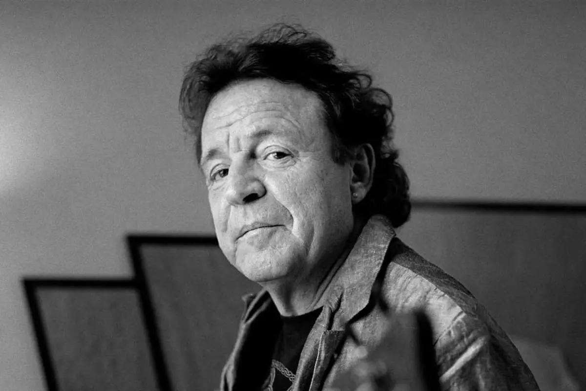 Jack Bruce in a seated indoors, looking calmly toward the camera.