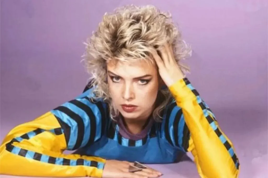 Kim Wilde with voluminous blonde 1980s hair poses.