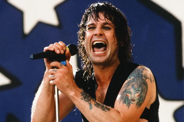 Ozzy Osbourne performing energetically onstage.