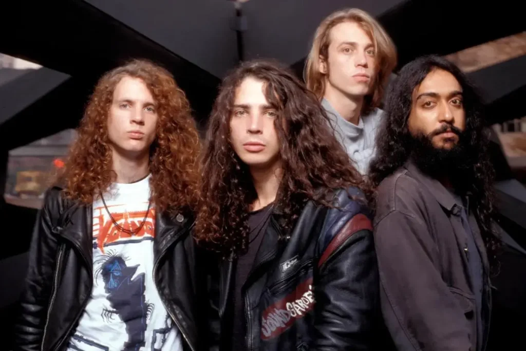 Soundgarden group portrait featuring all four members in a backstage setting.