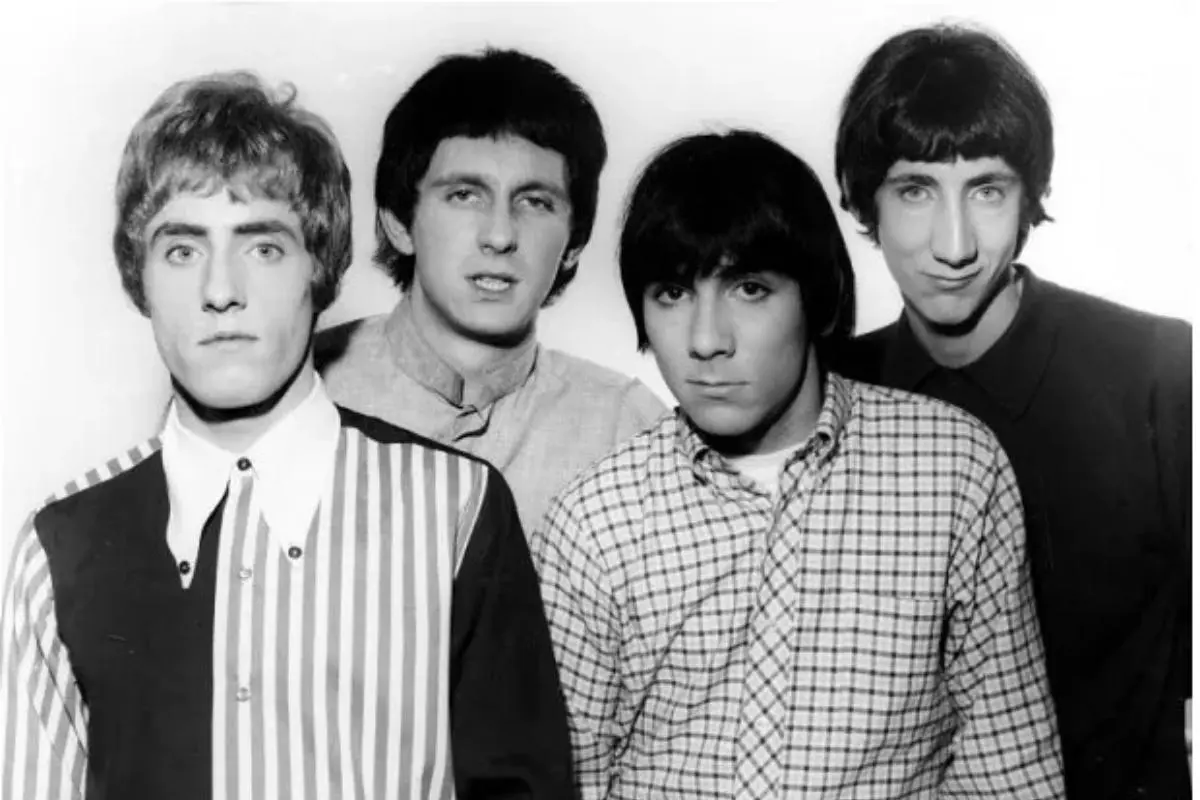 Roger Daltrey, Pete Townshend, John Entwistle, and Keith Moon in a black-and-white studio portrait from the early years of The Who.