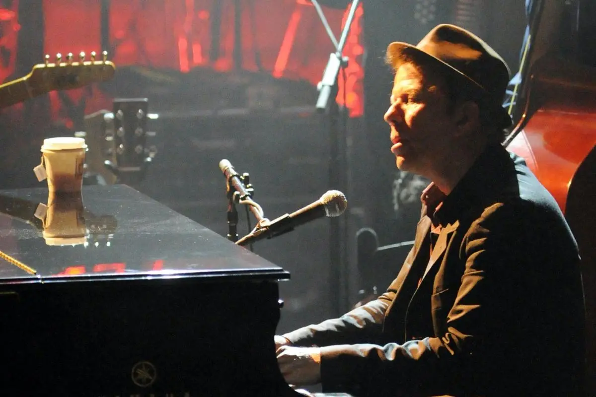Tom Wait performing on the stage with this piano.