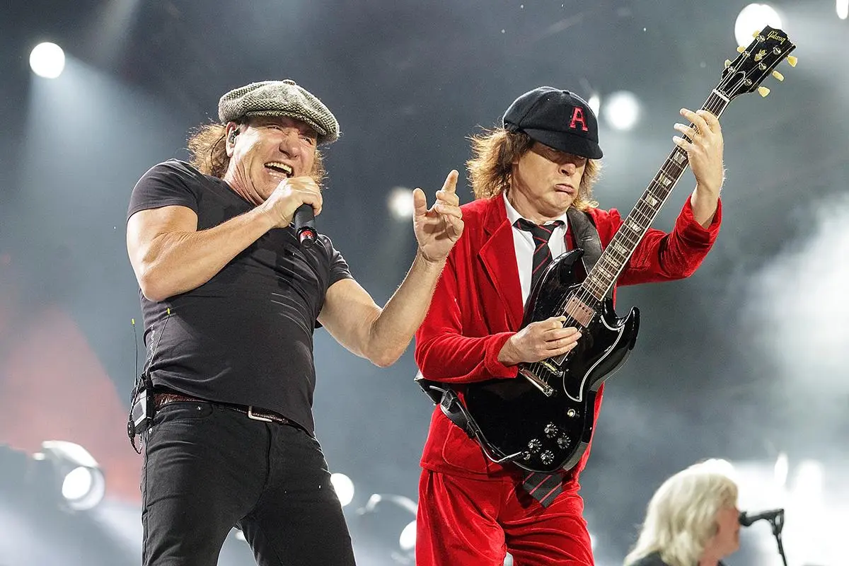 ACDC share the stage during a high-energy concert.