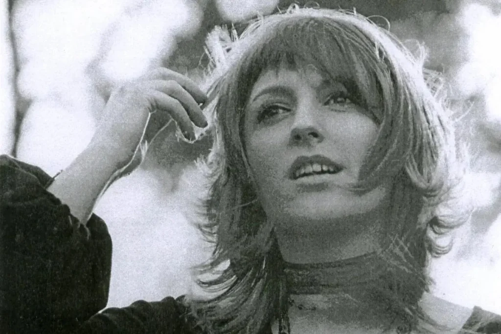 Clare Torry vs. Pink Floyd: The 30-Pound Take That Rewrote Rock Credit Clare Torry gazing upward while lightly touching her hair, with soft natural light in the background.