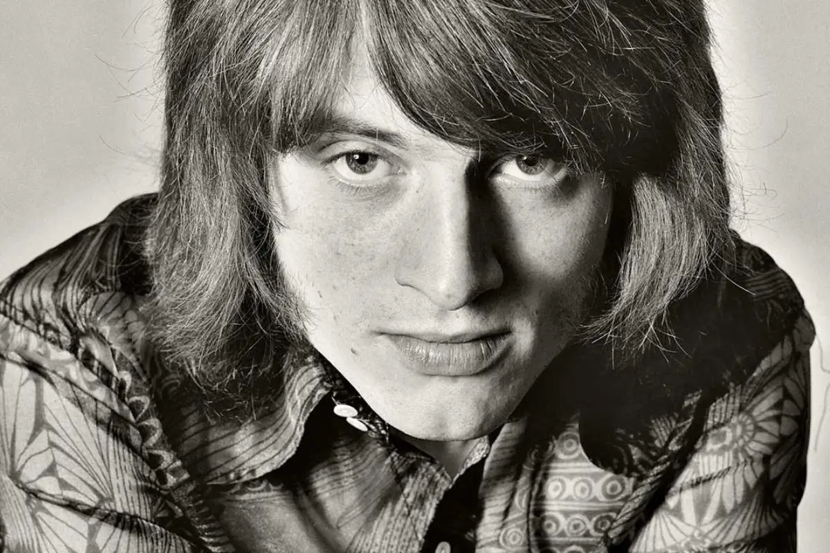 John Paul Jones with medium-length hair, looking directly at the camera with a calm, serious expression.