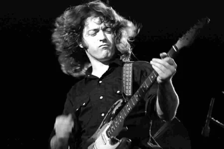 Rory Gallagher mid-performance, black-and-white concert photo