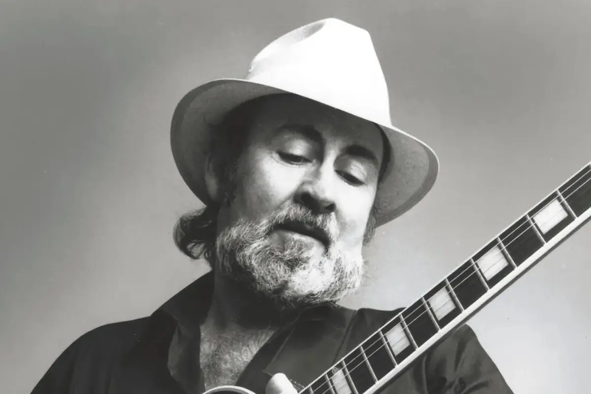 Roy Buchanan is captured mid-expression with his Telecaster, conveying the raw intensity and emotional force that defined his singular blues guitar voice.
