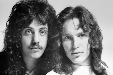 Black and white 1970 publicity portrait of Billy Joel and Jon Small of Attila, both with long hair, photographed head and shoulders against a plain background