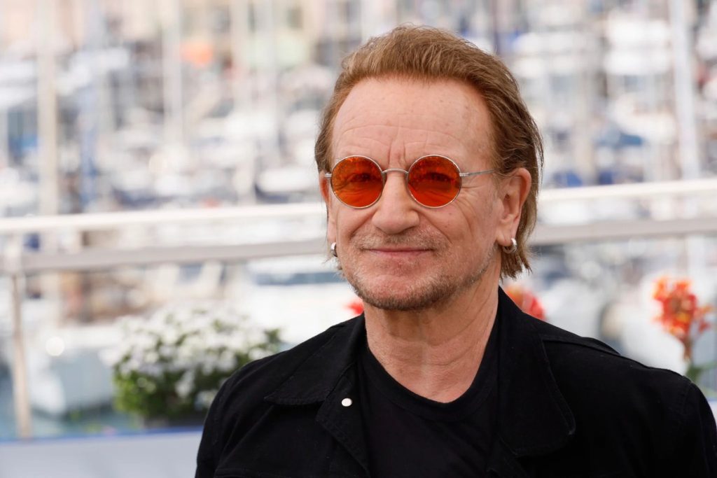 Bono Compares Israeli Minister Ben-Gvir to Himmler, and Ben-Gvir Fires Back Bono in orange-tinted round sunglasses and a black jacket at a photo call in Cannes