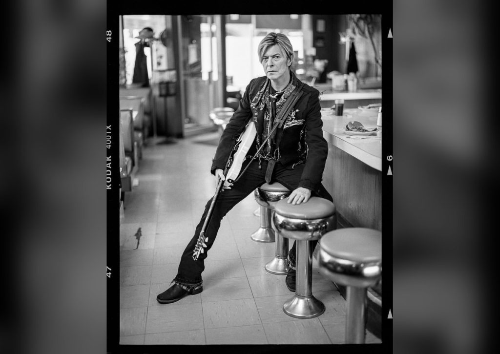 The Greek Newspaper Trick: How Bowie Spent Twenty Years Invisible in New York David Bowie in a diner, from a contact sheet