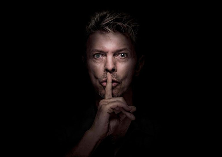 “A Parting Gift”: How Bowie Turned His Death Into His Final Album David Bowie with a finger raised to his lips