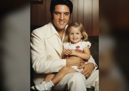 The Elvis Nobody Photographed: Home Between 1,128 Shows Elvis Presley at home holding his young daughter