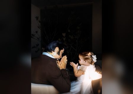 Elvis Presley with young Lisa Marie at Graceland