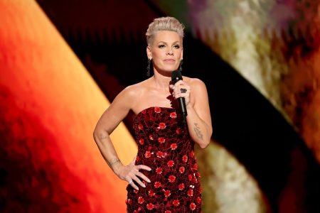 Pink Breaks a Week of Silence on the Macklemore Row With a 1,088-Word Essay Pink holding a microphone onstage in a red beaded gown at the 79th Annual Tony Awards