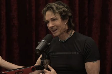 Rick Springfield Says a Mortar He Fired in Vietnam Killed a Man: “You Got One” Rick Springfield speaking into a studio microphone during a podcast interview