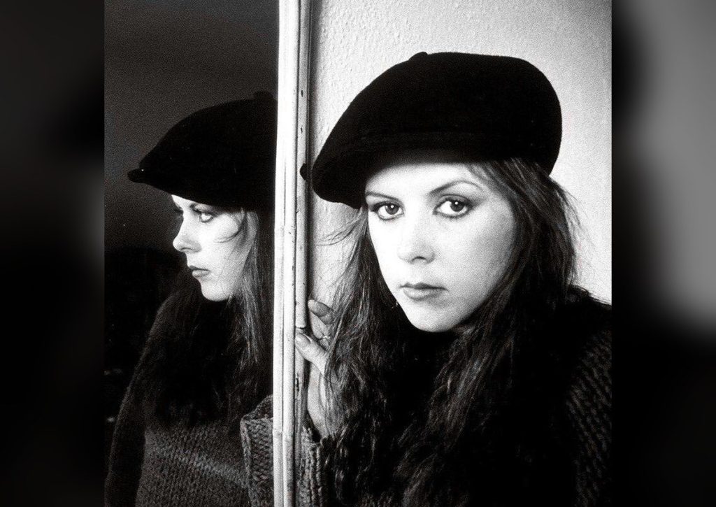 Kirsty MacColl: The Songwriter’s Songwriter Everyone Underestimated Kirsty MacColl in a black beret photographed beside her mirror reflection