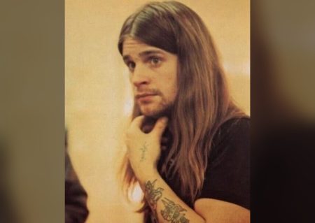 “He’s Not a Singer”: The Voice Everyone Doubted for Fifty Years Young Ozzy Osbourne sepia portrait with hand on chin