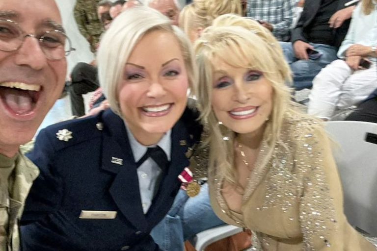 Dolly Parton’s Estate Names Niece Danielle Ambassador as Nephew Says He Was Kept From CMA Tribute Danielle Parton in Air Force dress uniform smiling beside Dolly Parton at Danielle's military retirement ceremony