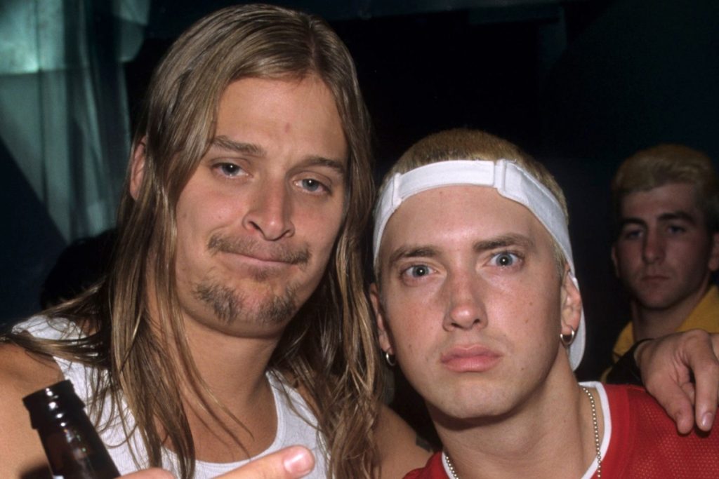 Eminem Says Kid Rock Collab Is ‘Not About Choosing Sides’ as Halfway 2 Jesus Drops, and Fans Are Still Split Kid Rock and Eminem posing together at an event, Kid Rock holding a beer bottle
